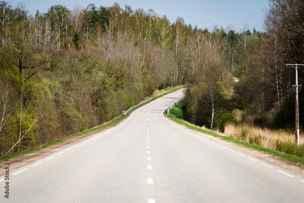 Fototapeta premium asphalt Road and the dramatic sky with strong perspective