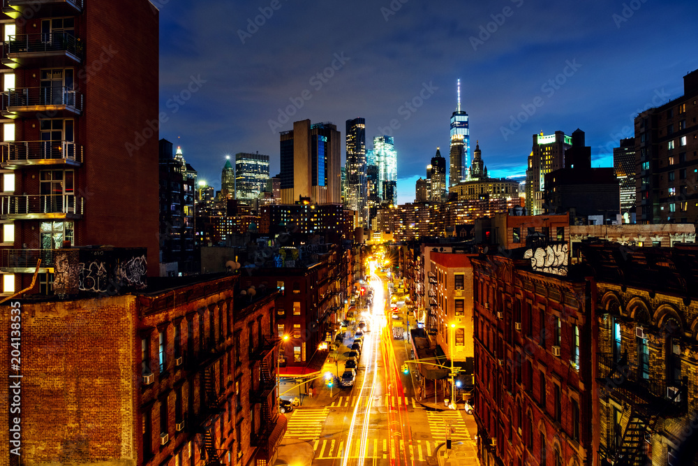 Obraz premium Aerial view of a chinatown street with various chinese restaurants, cafes and shops in New York, USA