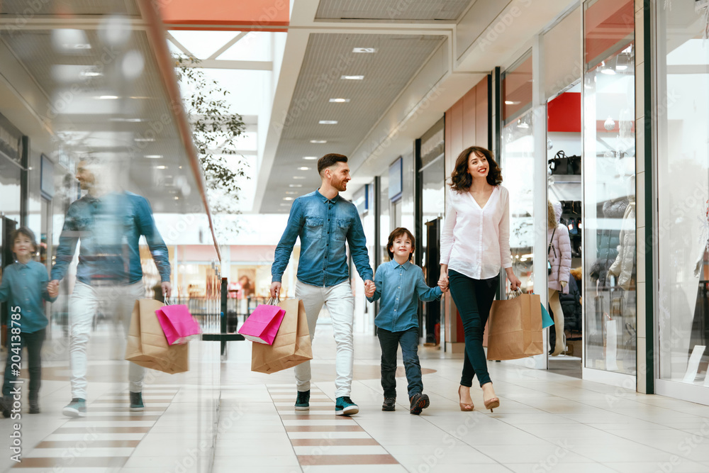 Family Shopping. Happy People In Mall Stock Photo | Adobe Stock