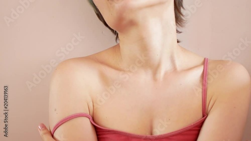 Hands of woman undressing brassiere. Close-up
