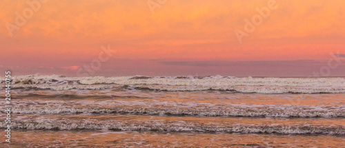 sunset on the beach in Punta Del Diablo - Uruguay photo