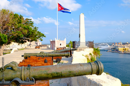Old cannons overlooking the city of Havana © kmiragaya