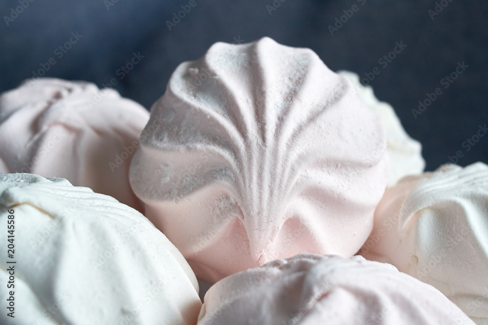 white and pink zephyr close-up on a white plate white and pink zephyr close-up on a white plate