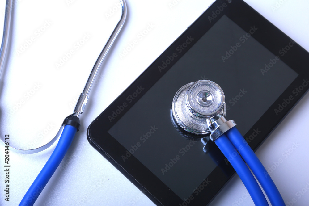 Medical equipment: blue stethoscope and tablet on white background - obrazy, fototapety, plakaty 