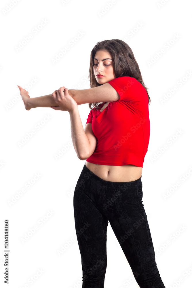 beautiful brunette teenager sport girl in red shirt is exercising, white background beautiful brunette teenager sport girl in red shirt is exercising, white background