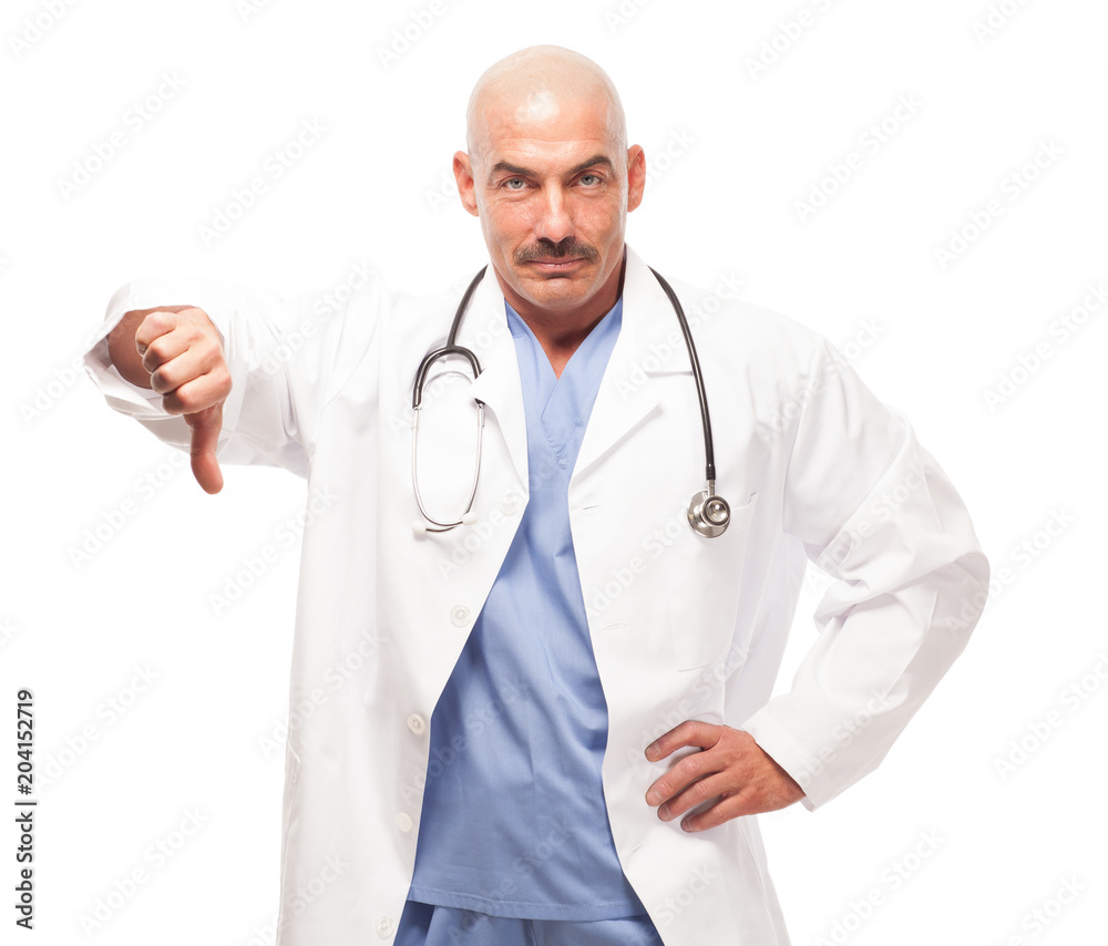 Doctor in scrubs and lab coat giving thumbs down. Doctor in scrubs and lab coat giving thumbs down.