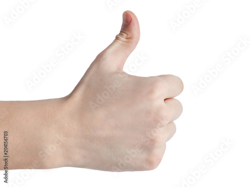 Gesture of approval on a white background. Thumbs up isolated.