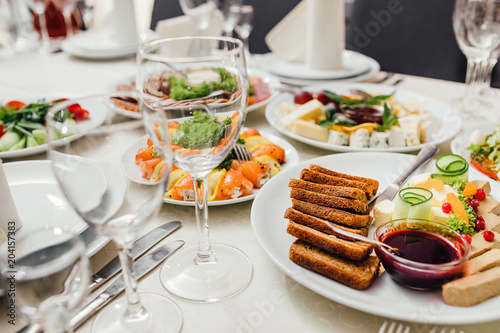 Beautifully decorated catering banquet table with different food