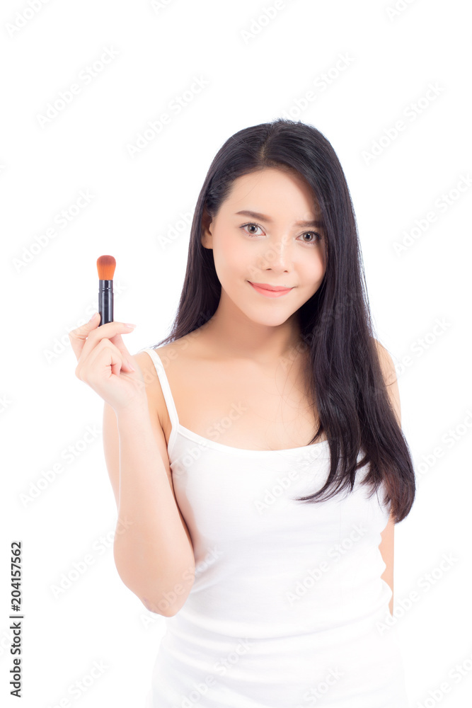 Portrait of beauty asian woman applying make up with brush of cheek isolated on white background, beautiful of girl holding blusher, skincare and cosmetic concept. Portrait of beauty asian woman applying make up with brush of cheek isolated on white background, beautiful of girl holding blusher, skincare and cosmetic concept.