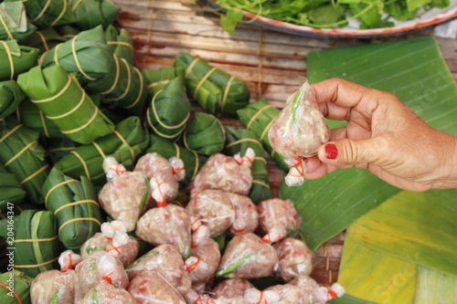 Sour pork wrapped in banana leaves delicious