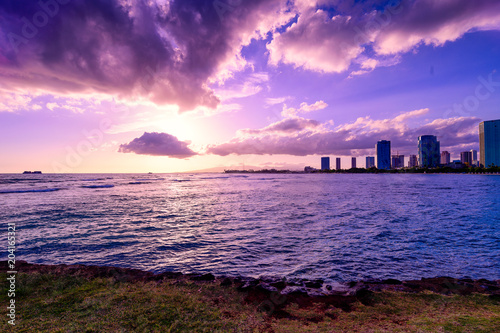 Beautiful paradise sunset at Ala moana beach park in Hawaii photo