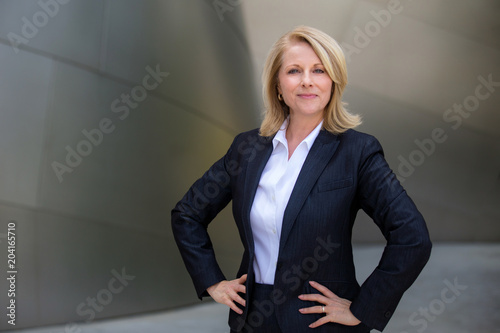 Confident proud successful business woman portrait, standing with confidence