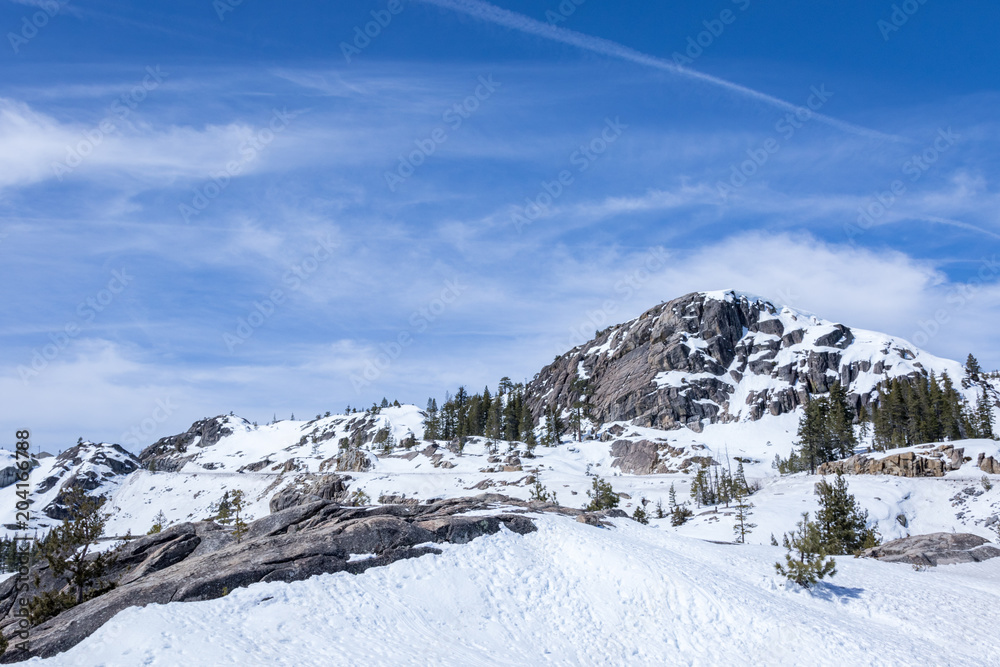 Snowy mountain with clear skies