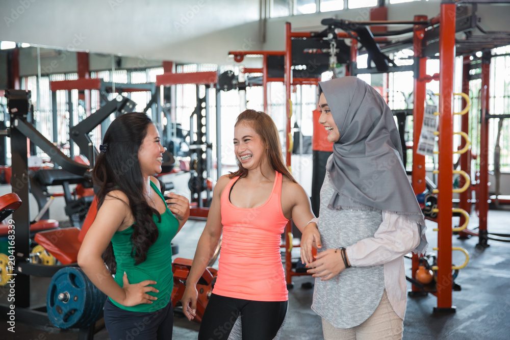 Fototapeta premium Group of three women after working out
