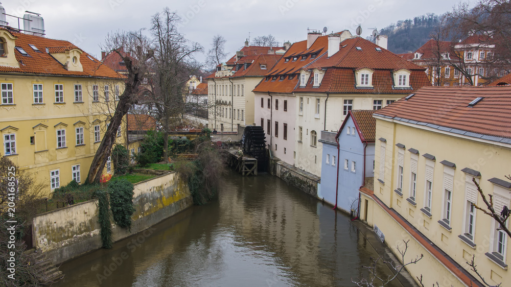 Praha street houses, river canal