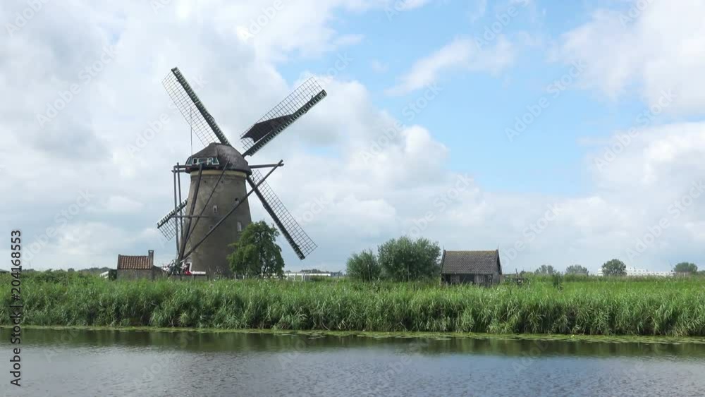 Ancient Windmills near the River at Netherlands Landscape. 4K Ultra HD Ancient Windmills near the River at Netherlands Landscape. 4K Ultra HD