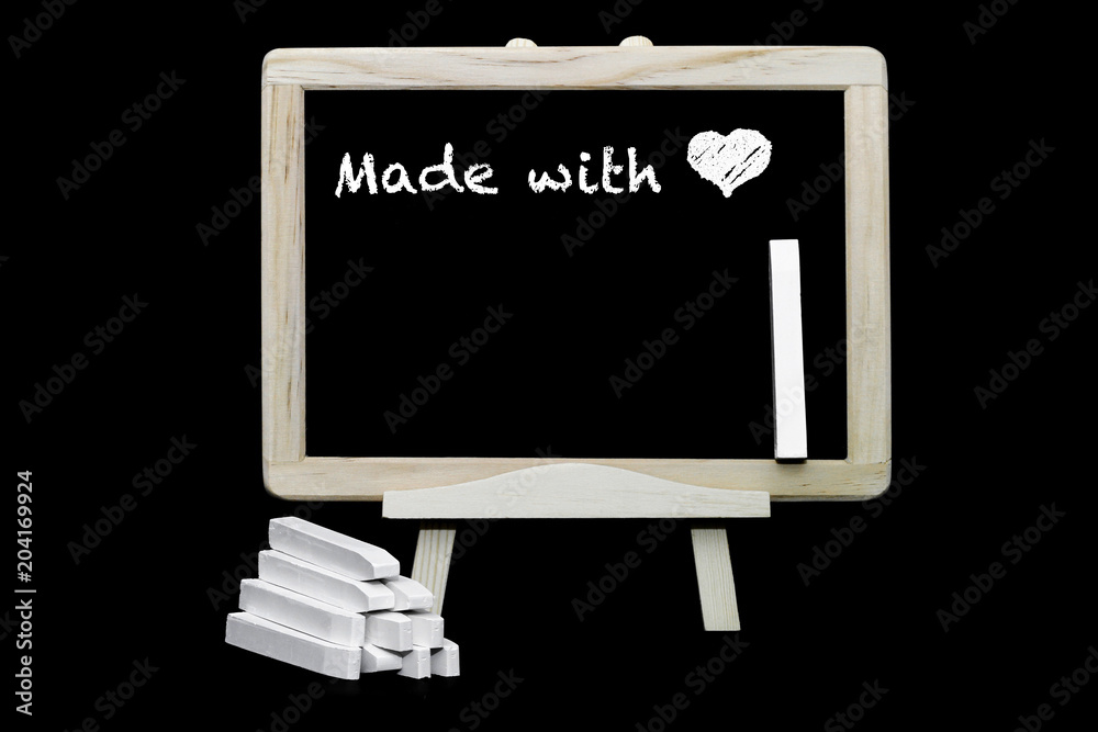 Made with love symbol on blackboard