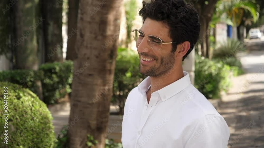 Smiling guy in glasses