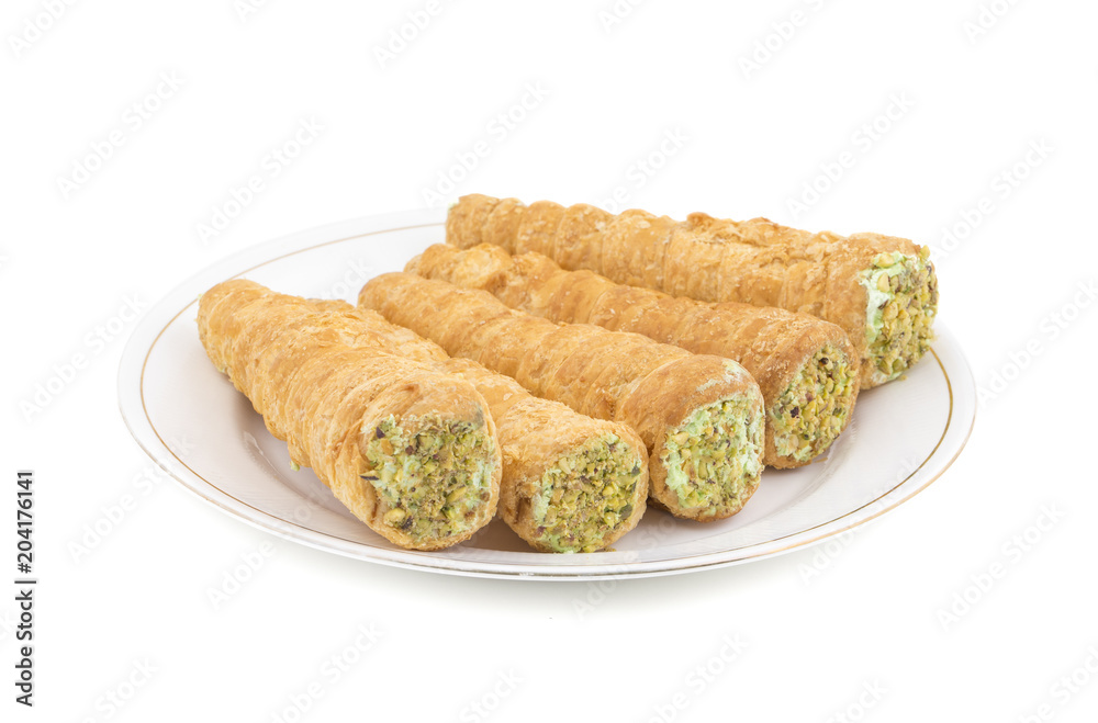 Sweet Bakery Food Puff Roll with Cream Also Know As Homemade Cream Roll, Puff Pastry, Swiss And Jelly Roll is a type of sponge cake roll filled with whipped cream, jam isolated on White Background Sweet Bakery Food Puff Roll with Cream Also Know As Homemade Cream Roll, Puff Pastry, Swiss And Jelly Roll is a type of sponge cake roll filled with whipped cream, jam isolated on White Background