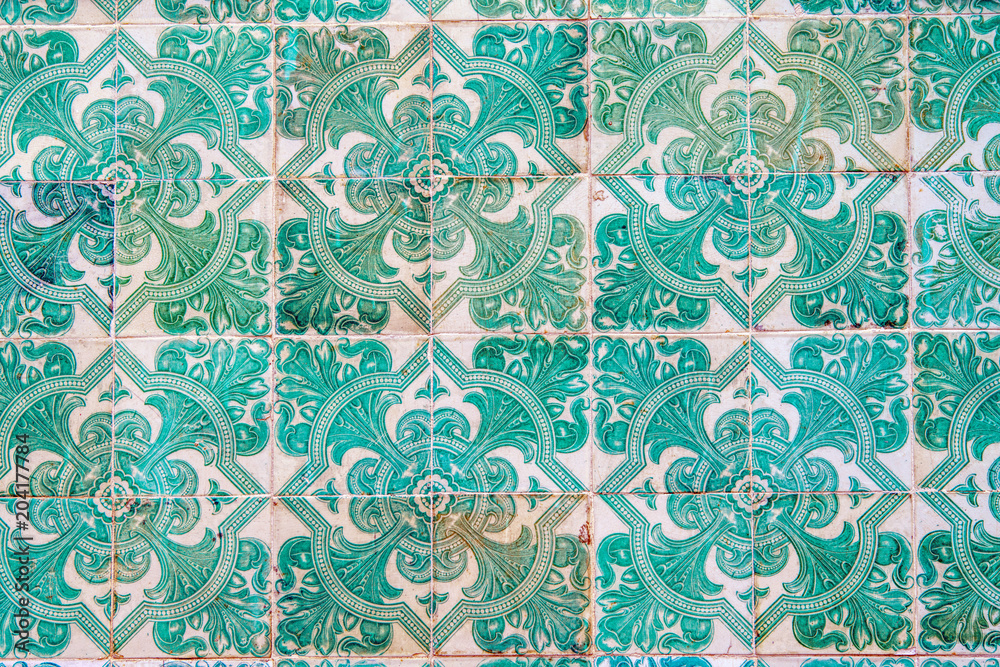 Detail of the traditional tiles from facade of old house