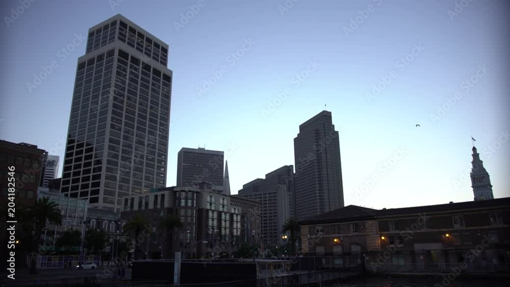 SAN FRANCISCO, CALIFORNIA - JULY 20 2017: Cars, people and buildings in a normal day in the urban space of Silicon Valley. SAN FRANCISCO, CALIFORNIA - JULY 20 2017: Cars, people and buildings in a normal day in the urban space of Silicon Valley.