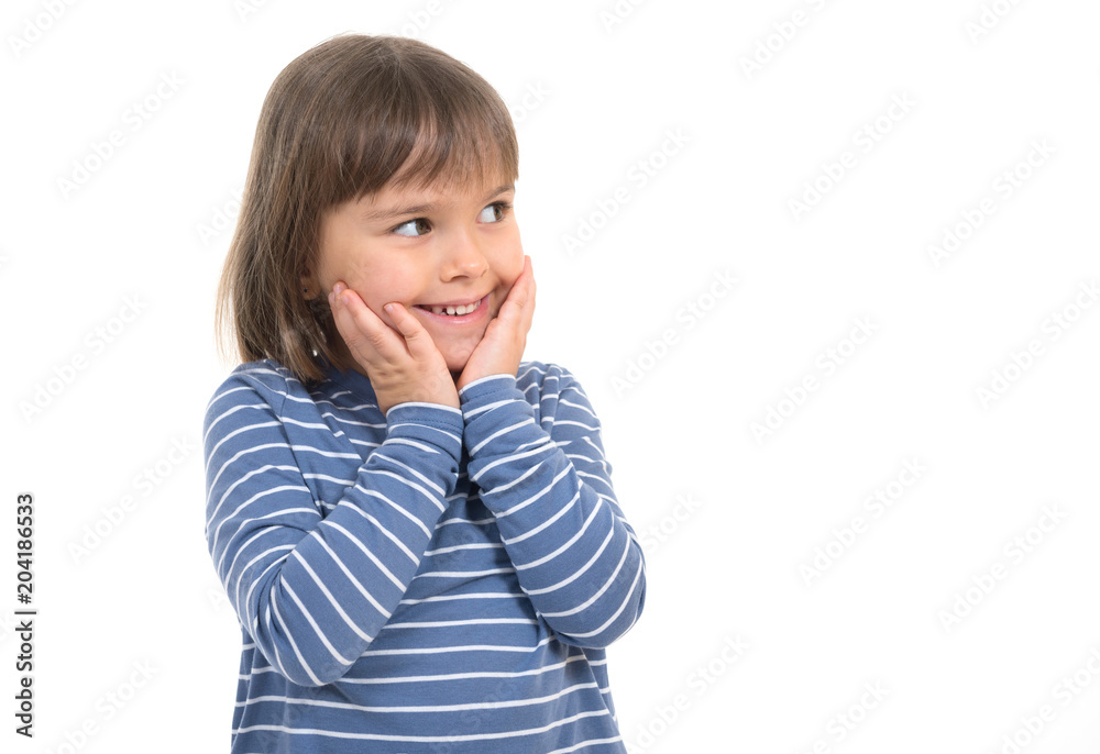 A little happy kid is looking aside against the white isolated background for posting your information. A little happy kid is looking aside against the white isolated background for posting your information.