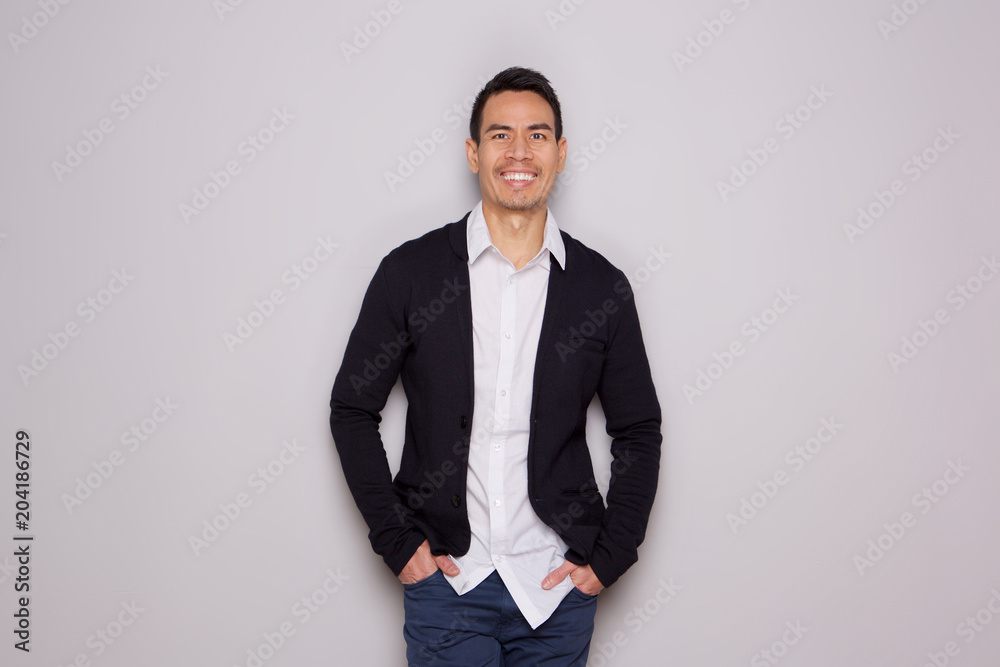Stylish middle aged man posing on white