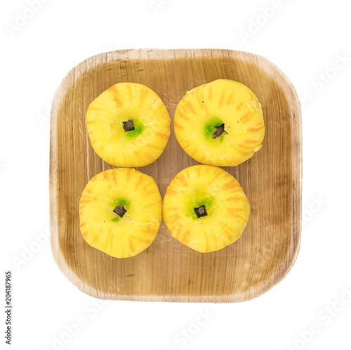 Apple Shaped Indian Dry Sweet Peda also called pedha, pera or peday is a prepared in thick, semi-soft pieces. the main ingredients are khoya, sugar and flavorings, including cardamom seeds photo