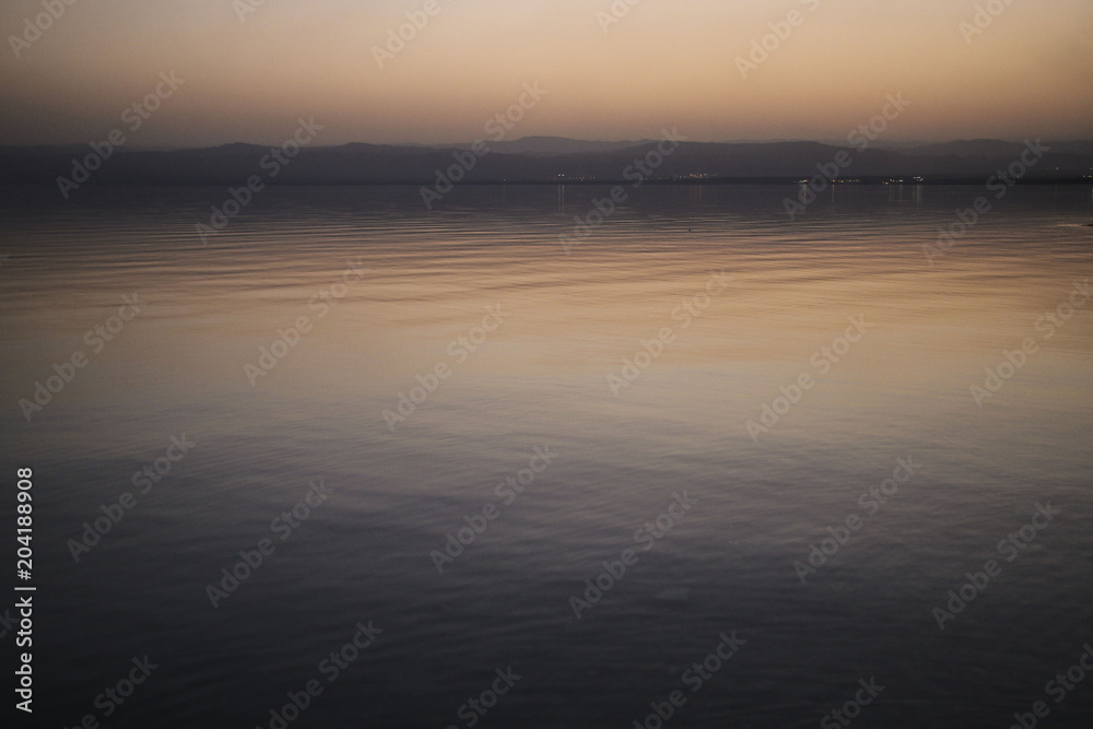 Golden sunset over the Dead Sea and the mountains, Jordan