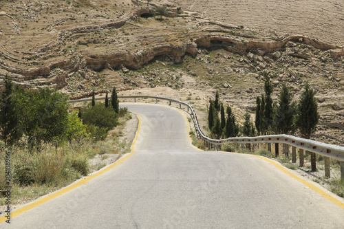 Mountain road through the mountains in early spring in Jordan