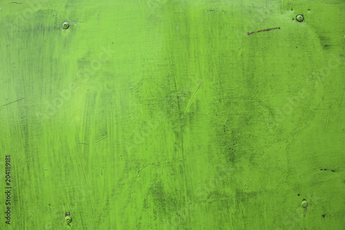 Rusty green metal texture. Industrial background. Green rusty iron plate.
