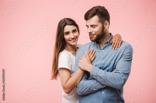 Portrait of a lovely young couple hugging