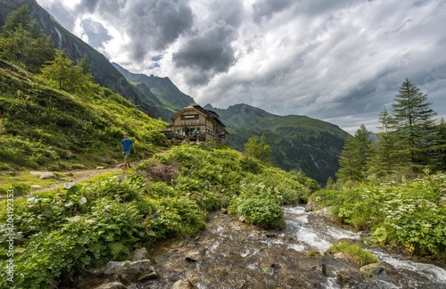 Gollinghutte at Steinriesenbach, cloudy sky, Schladminger Hohenweg, Schladminger Tauern, Schladming, Styria, Austria, Europe photo