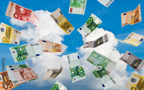 Euro money fallig down on the sky photo