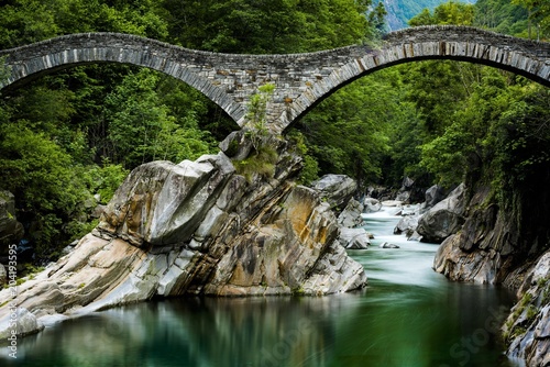 Verzasca river with arched bridge Ponte die Salti, Lavertezzo, Ticino, Switzerland, Europe photo