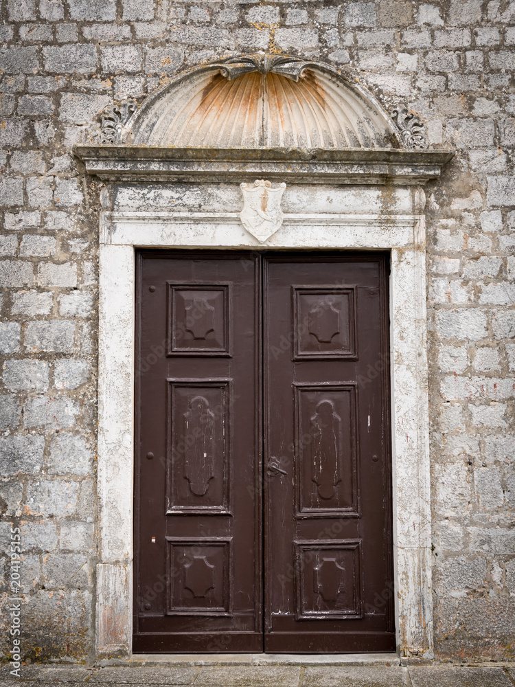 Closed door of a christian monastery in Croatia Closed door of a christian monastery in Croatia