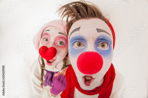 emotional and funny mime guy and girl posing on camera. Human emotions