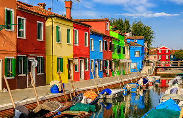 Acrylglasbilder Orange Picturesque canal and colorful houses in Burano island near Venice Italy  © SvetlanaSF