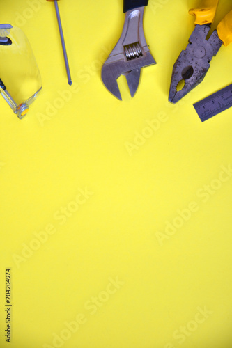 tools on the yellow background close-up