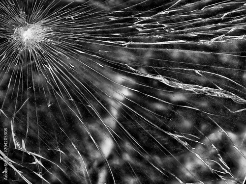 The broken glass.The cracks texture.  Background.Grunge.Abstract lines.
