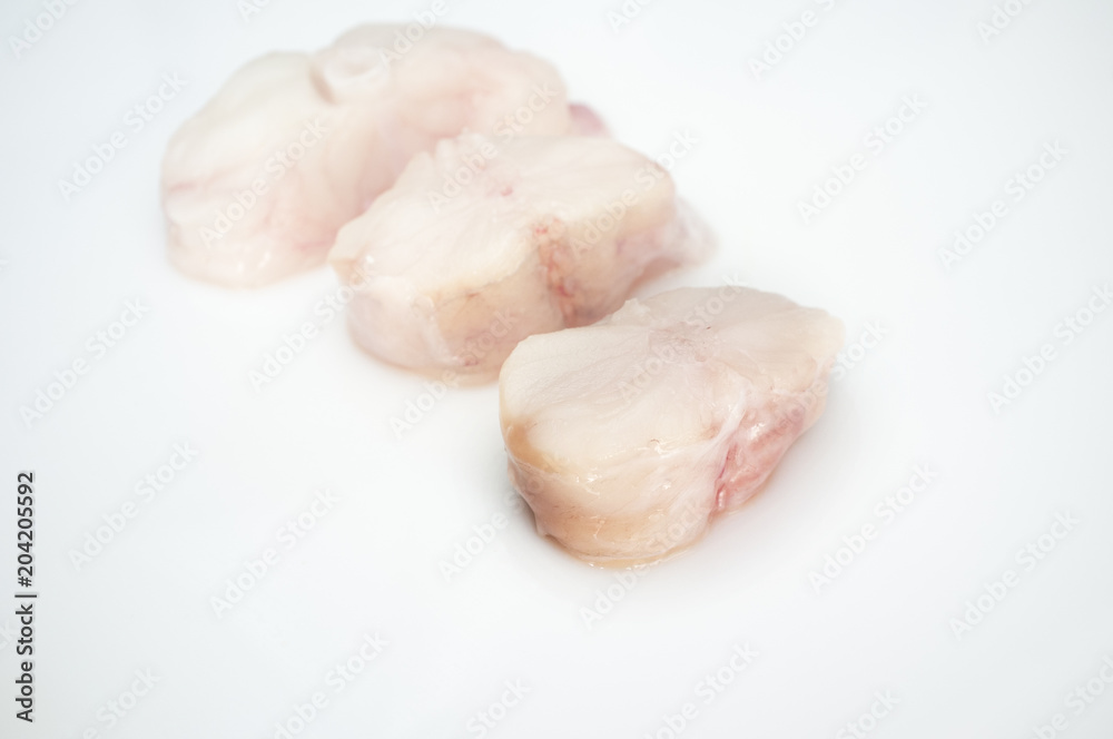 Monkfish tail steaks. Isolated over white Monkfish tail steaks. Isolated over white