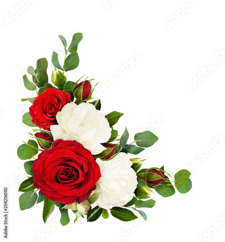 Red and white rose flowers with eucalyptus leaves in a corner arrangement