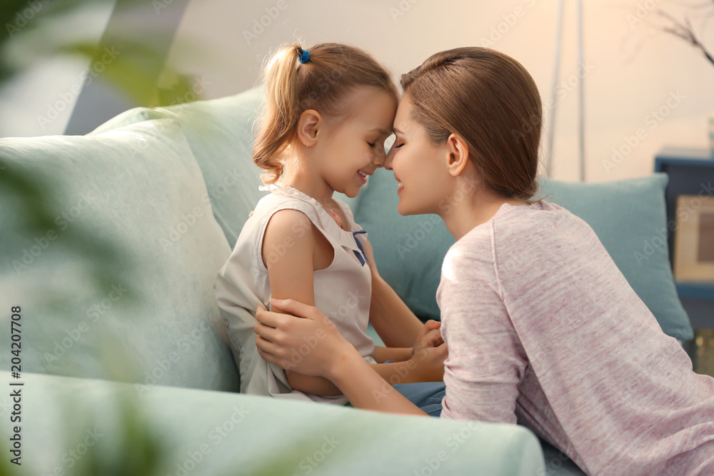 Portrait of happy mother and daughter at home Portrait of happy mother and daughter at home