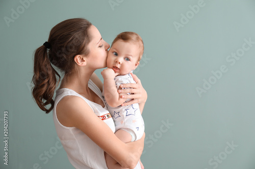 Young mother with her cute ...