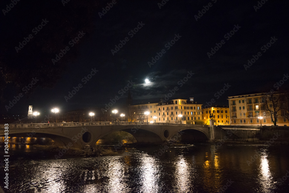 Verona - Pietra bridge on Adige river at night-Italy