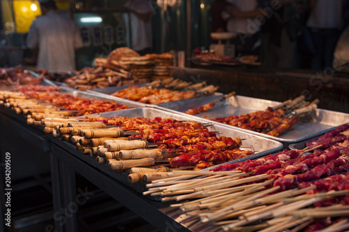 Fényképezés Detail of lamb kebab in a street market at the Muslim Quarter in the city of Xian, in China