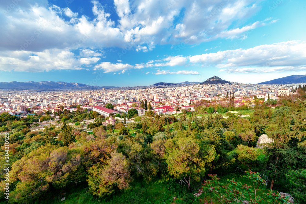 Greece, Athens. Beautiful spring skyline of Athen city, view on famous Agora mountain.