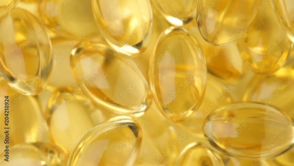 Close up of rotating pills. No sound. Close up of rotating pills. No sound.