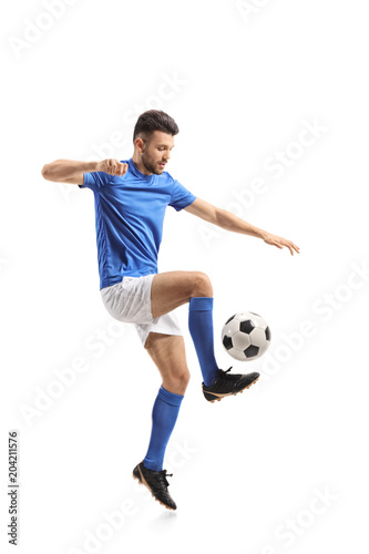 Soccer player juggling © Ljupco Smokovski