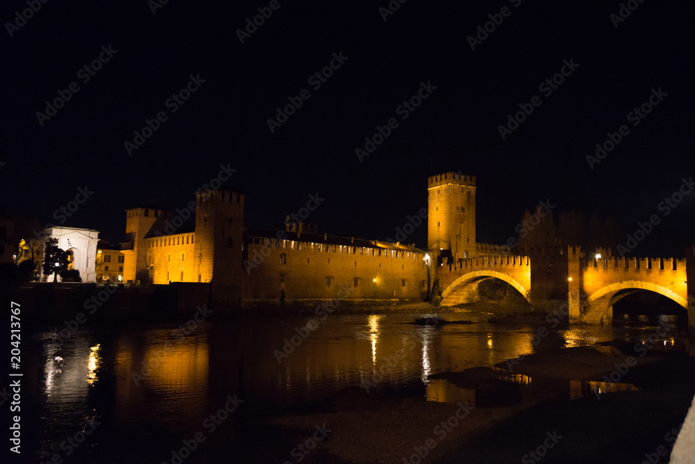 cityscape on the riverside with historical buildings and towers view of Verona City. Italy